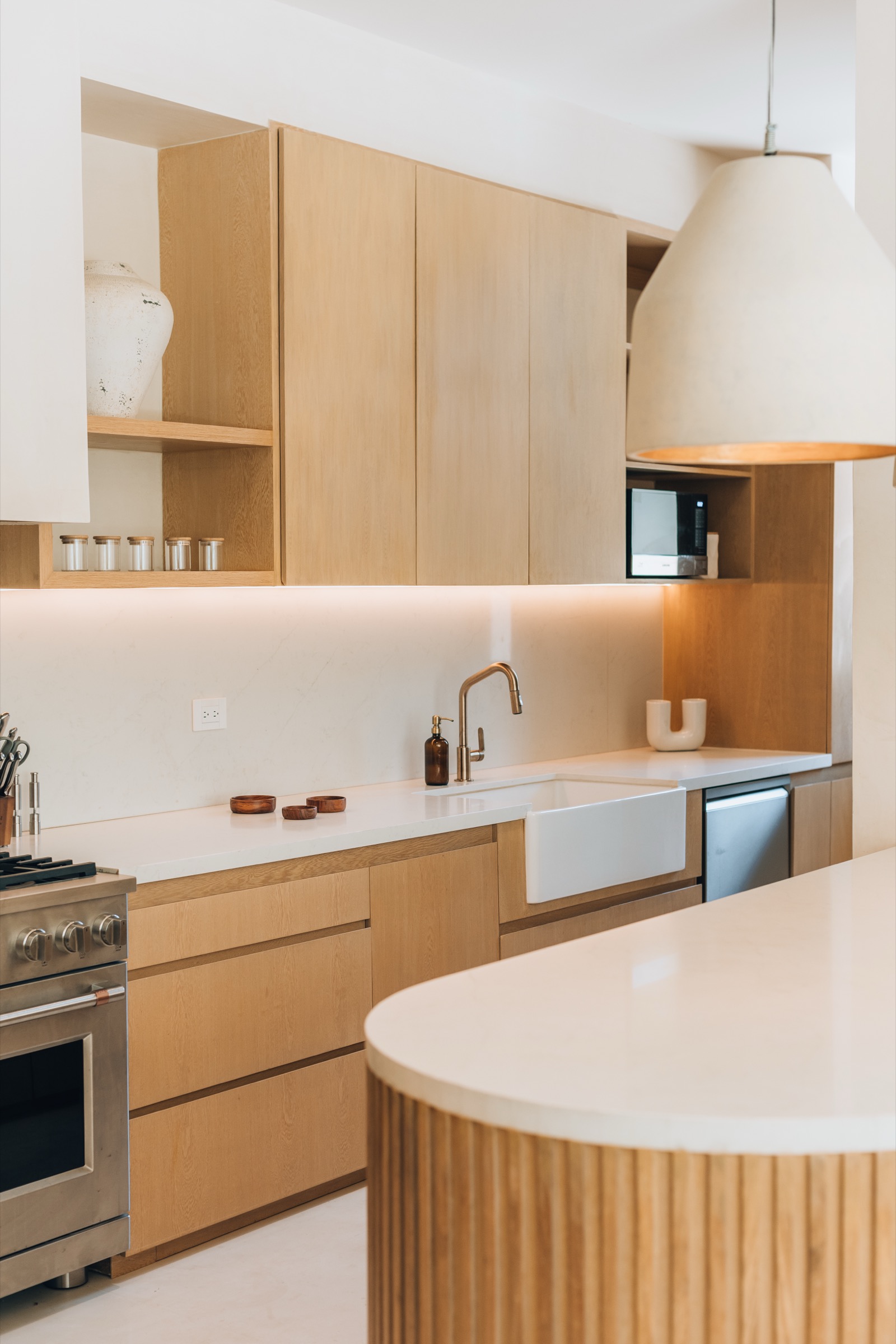 Essence Luxury Villa kitchen with oak cabinetry