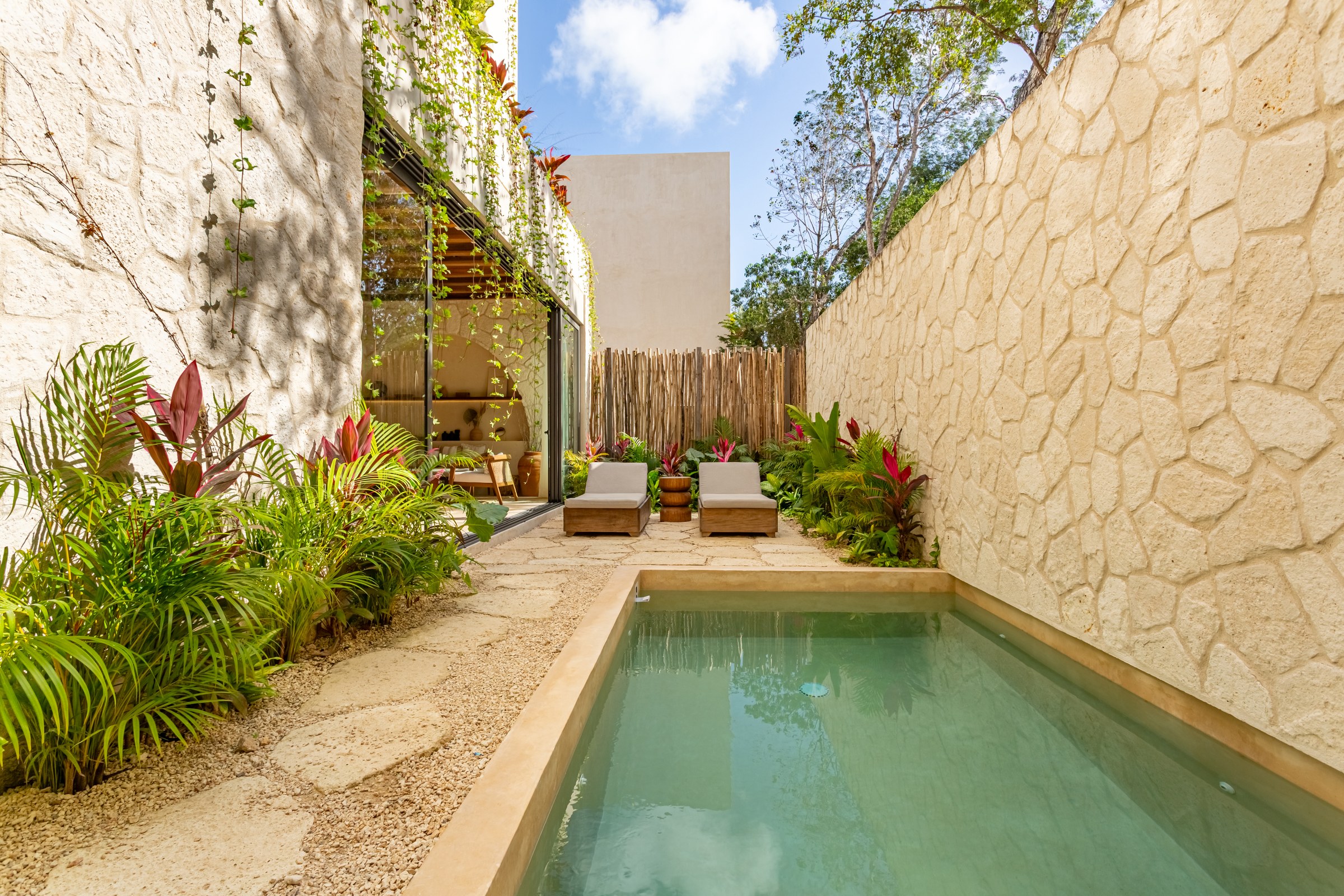 Villa Jaguar pool courtyard at AMARI Uptown
