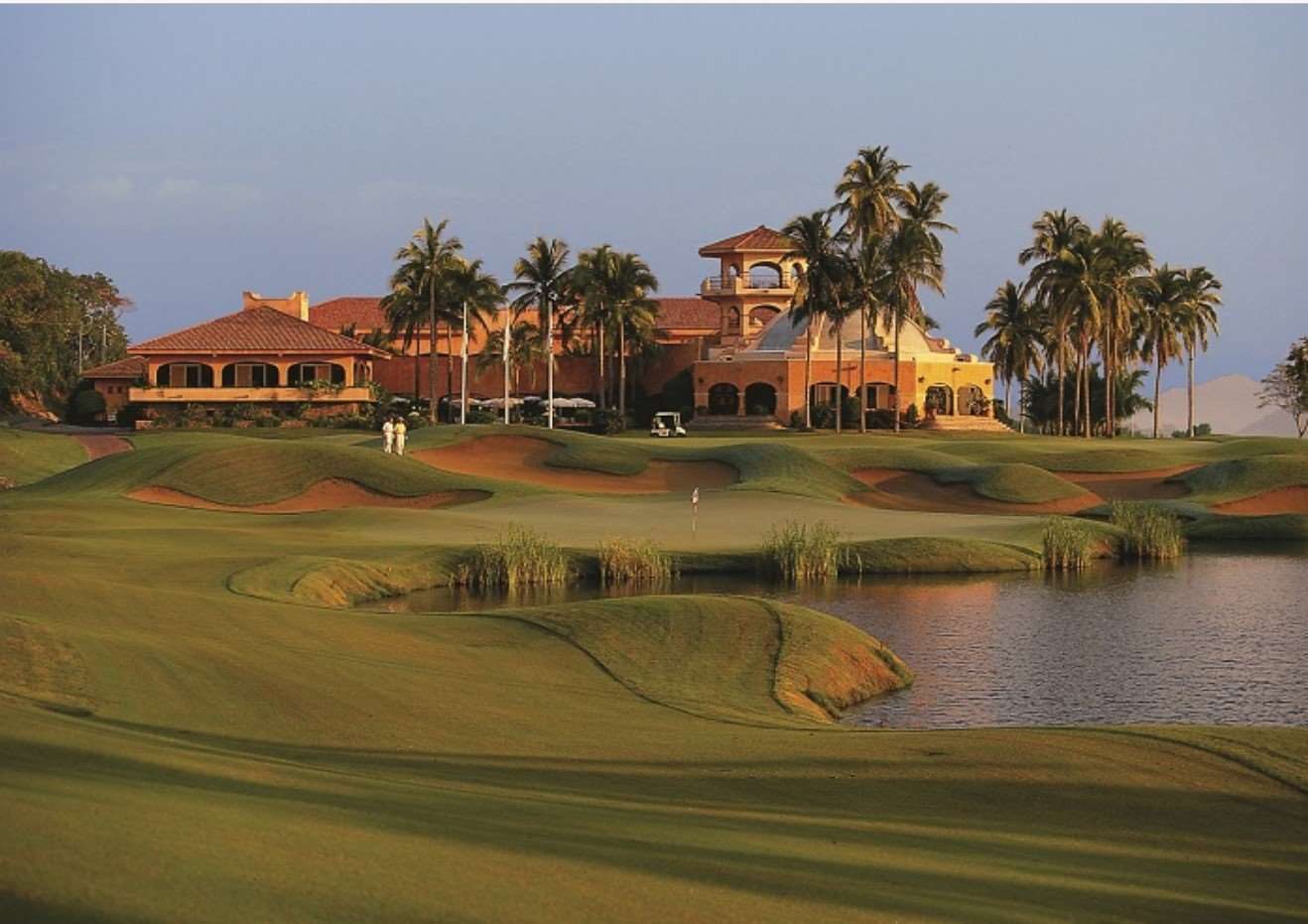 Golf course and clubhouse across water