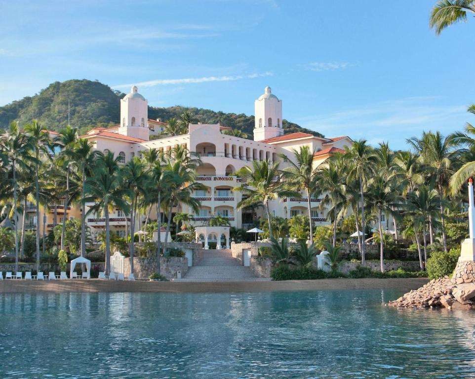 Grand Bay hotel towers above the lagoon