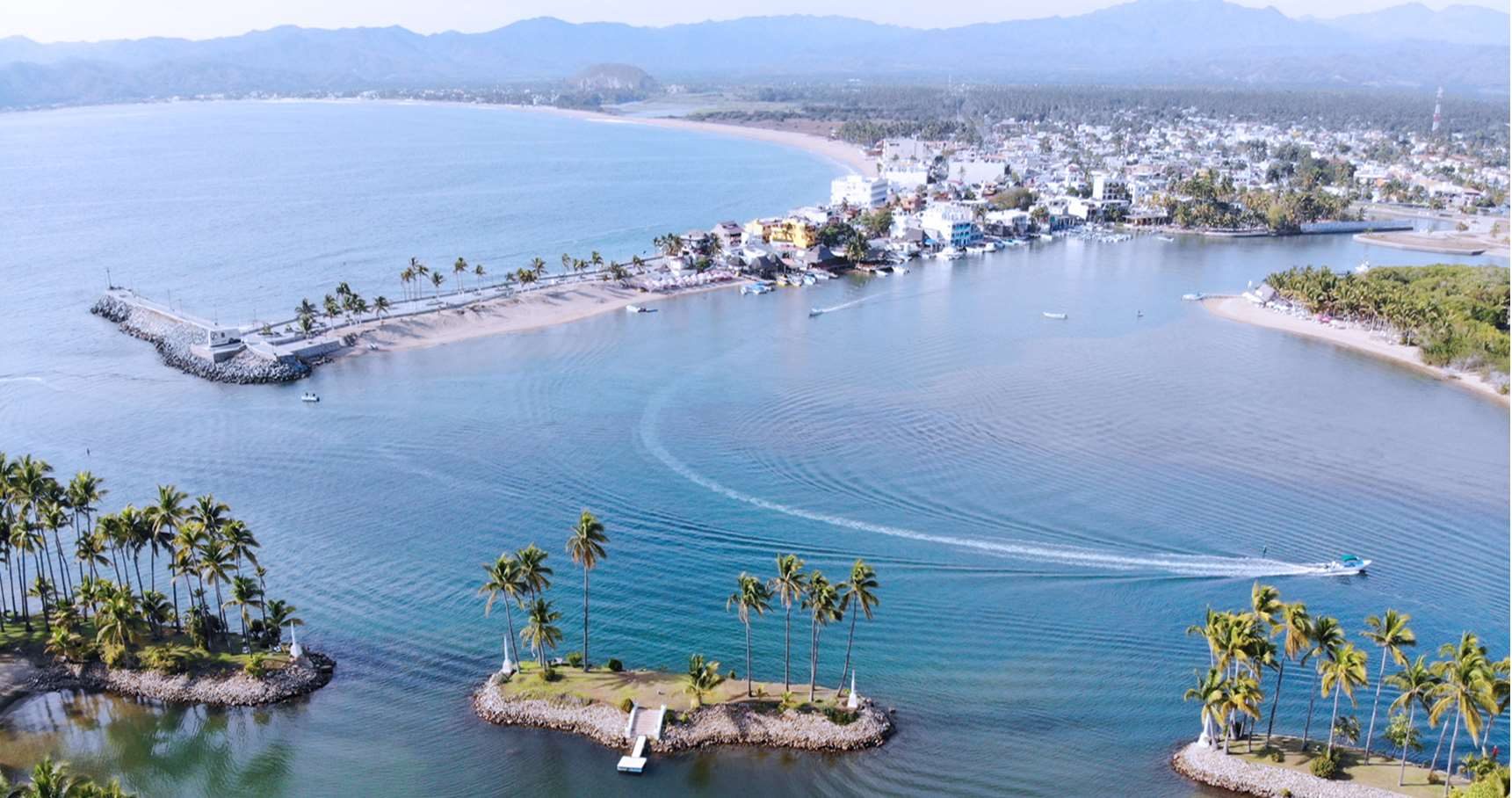 Aerial of Barra de Navidad and the lagoon mouth seen from Isla Navidad