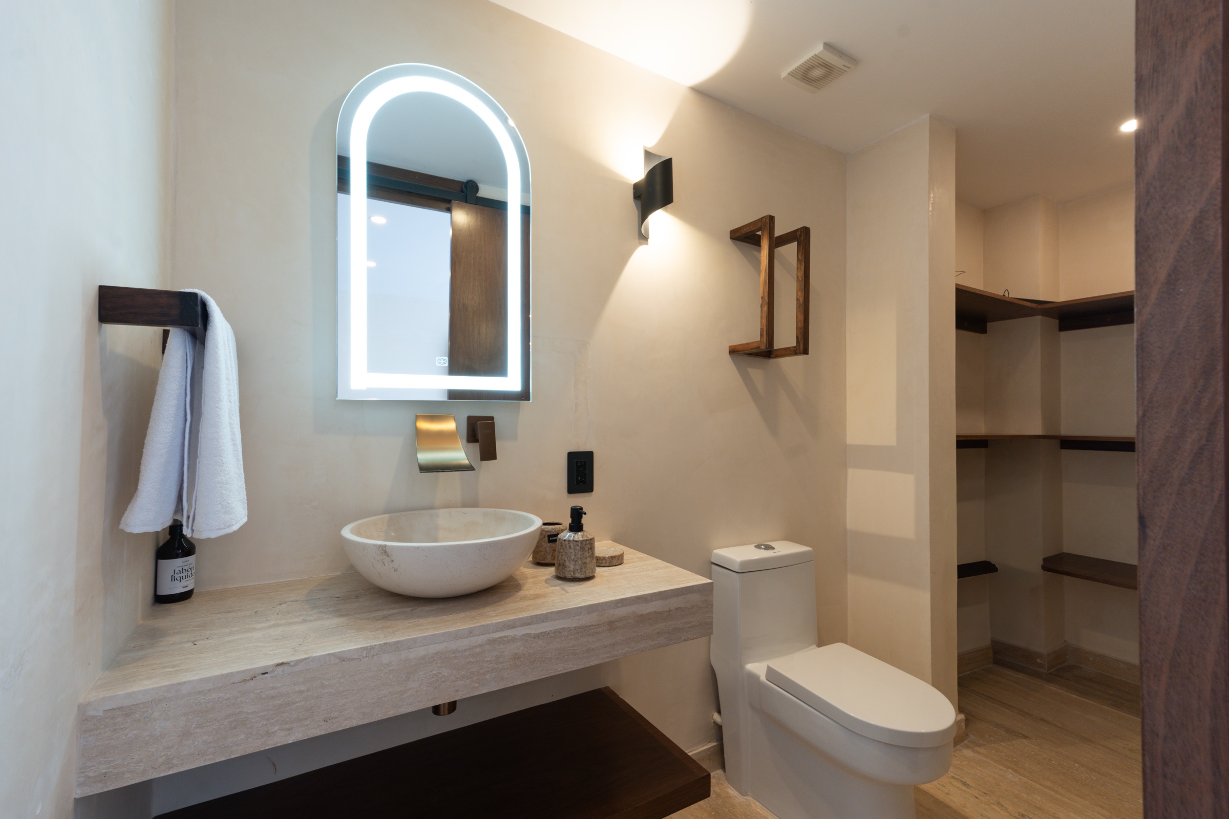 Bathroom and walk-in closet in the MAIA sales showroom