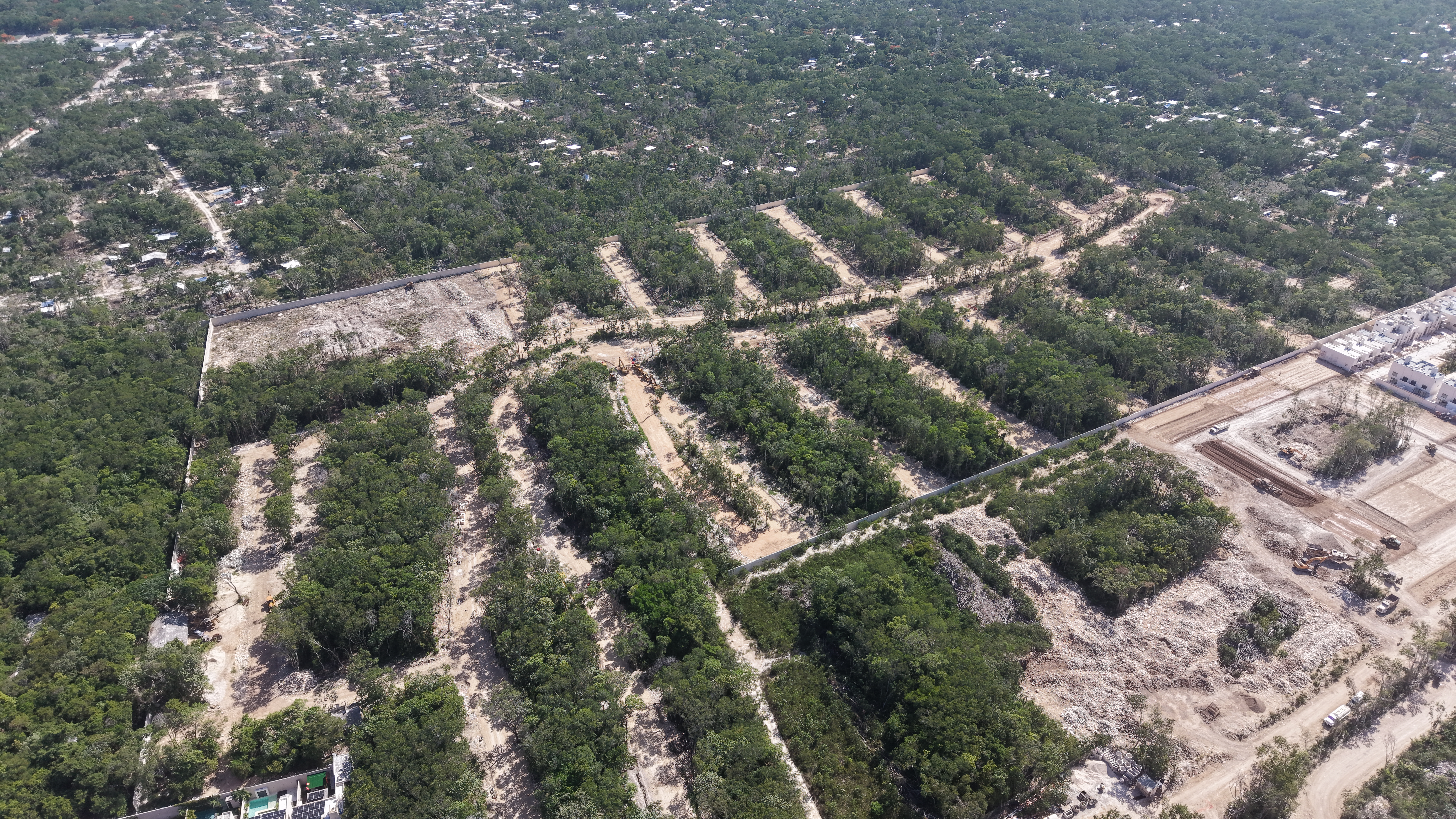 Aerial construction photograph of Costa Montenia, July 2026