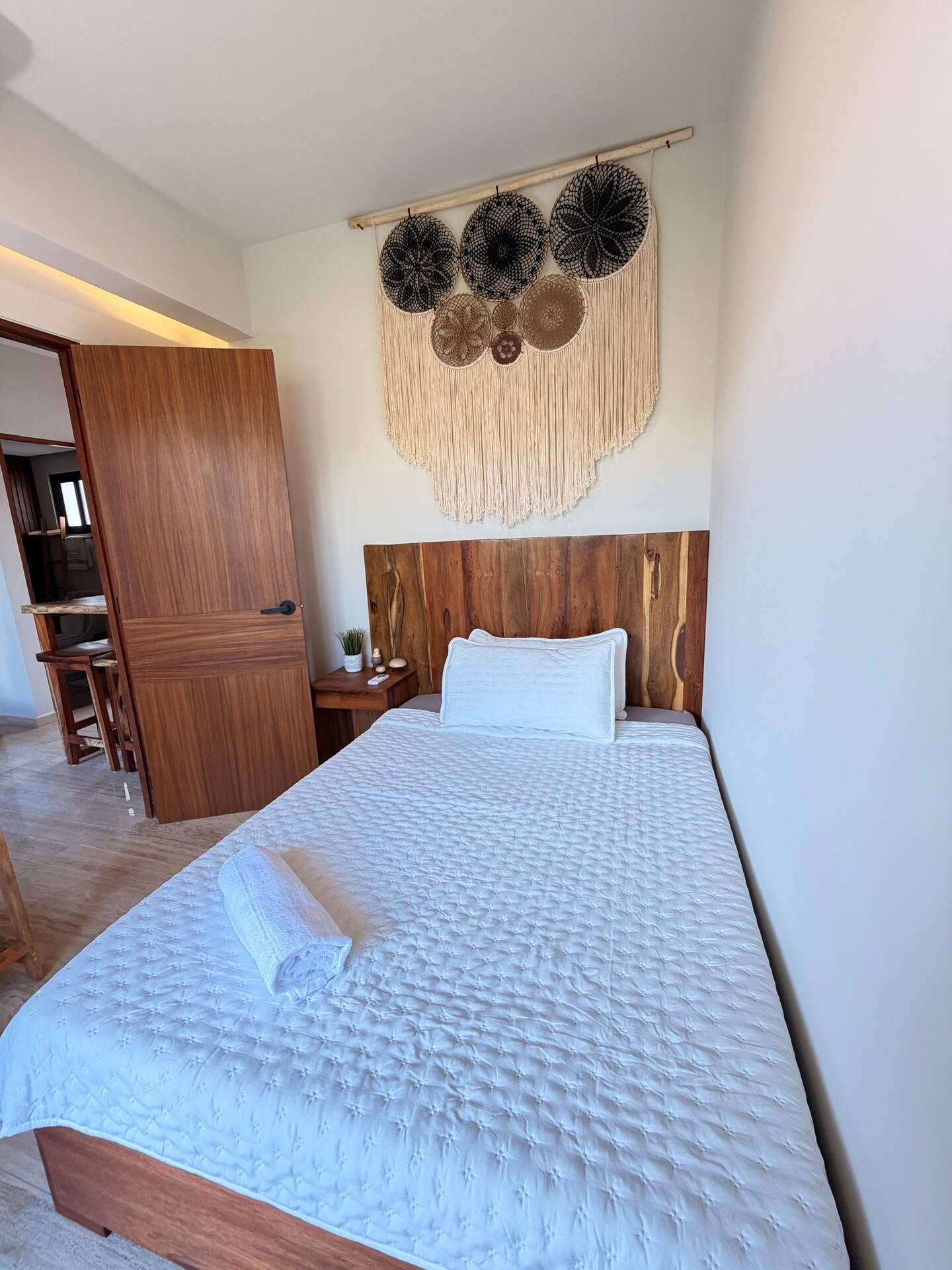 Second bedroom of unit F303 with a full and twin bunk bed