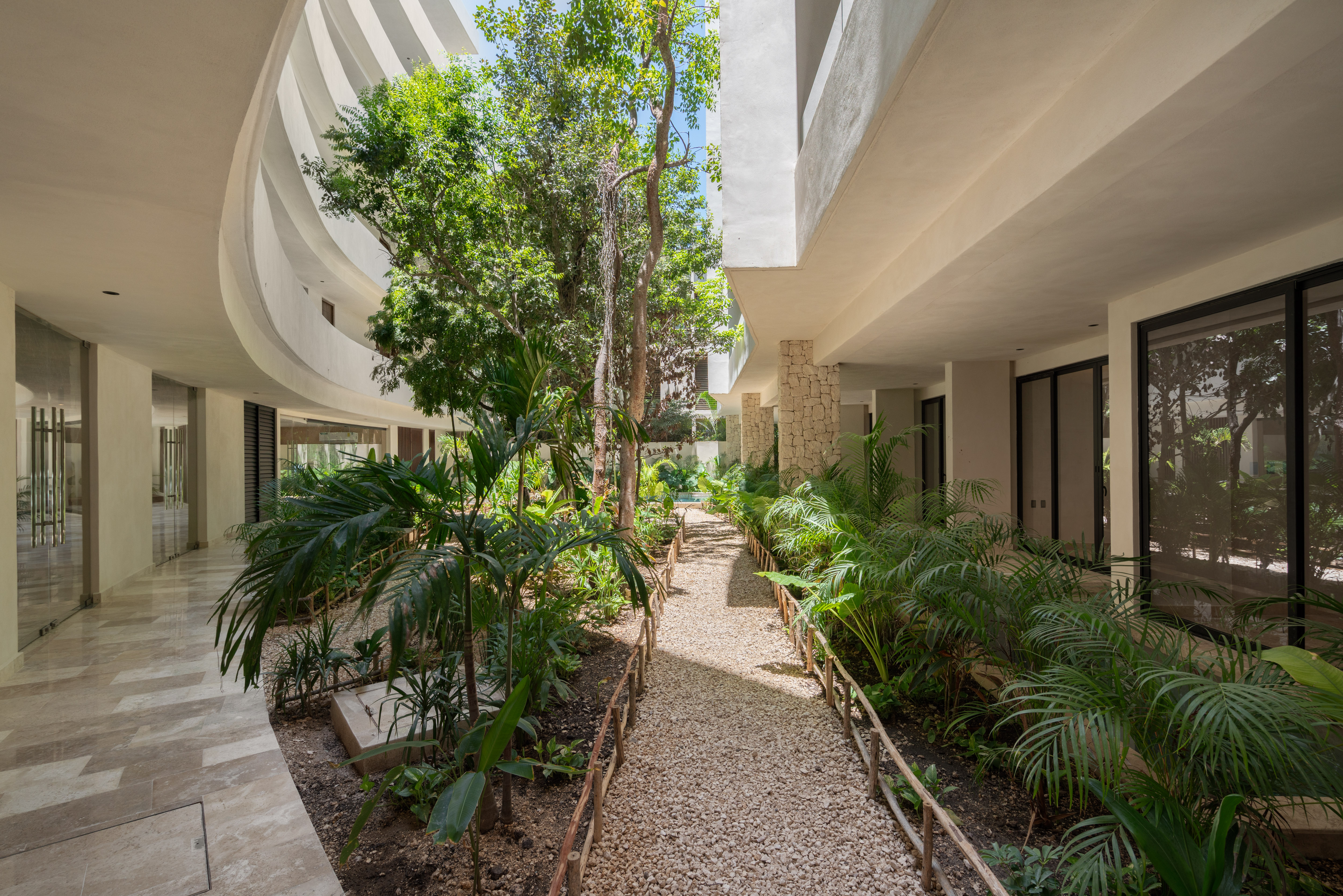 Interior garden path between the building’s wings