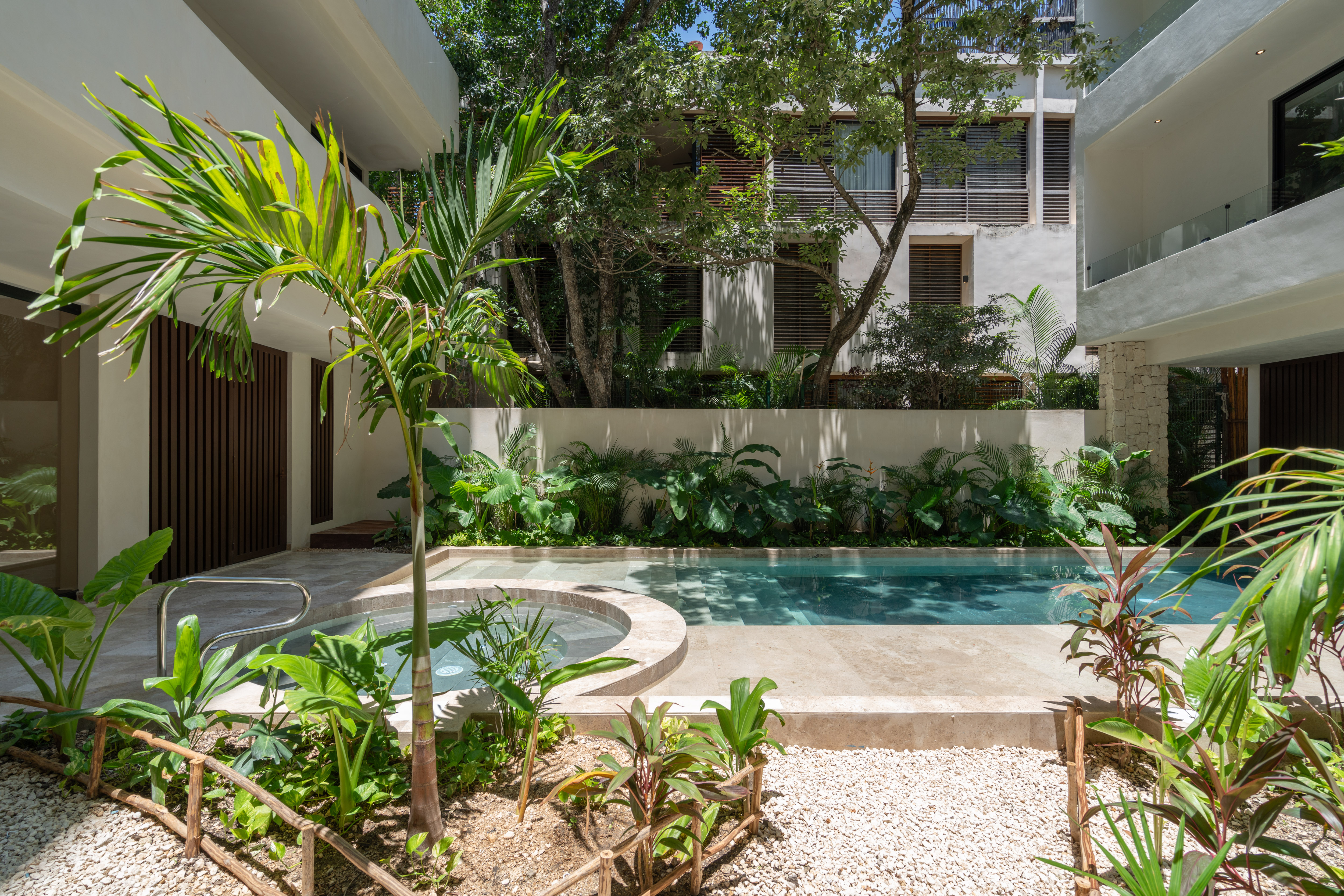 Narai's rooftop and ground-floor pools in Aldea Zamá, Tulum