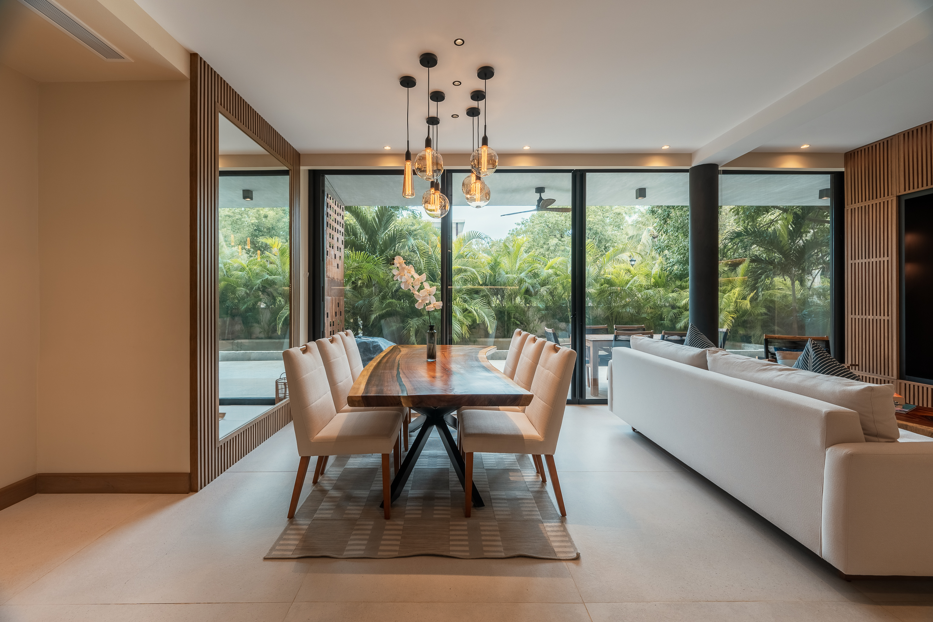 Dining room with pendant lighting in the model residence
