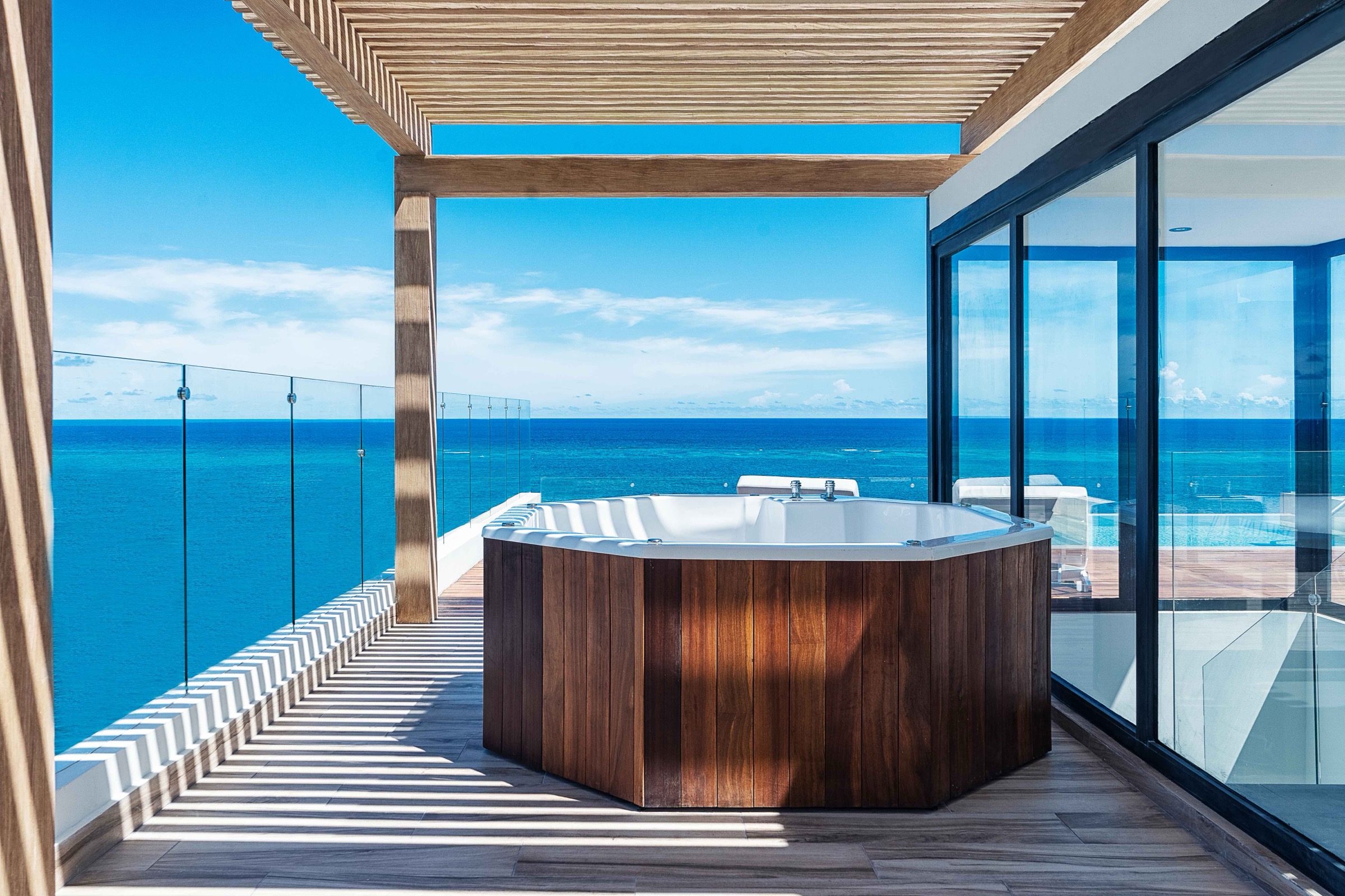 Rooftop plunge pool with ocean view at The Fives Oceanfront