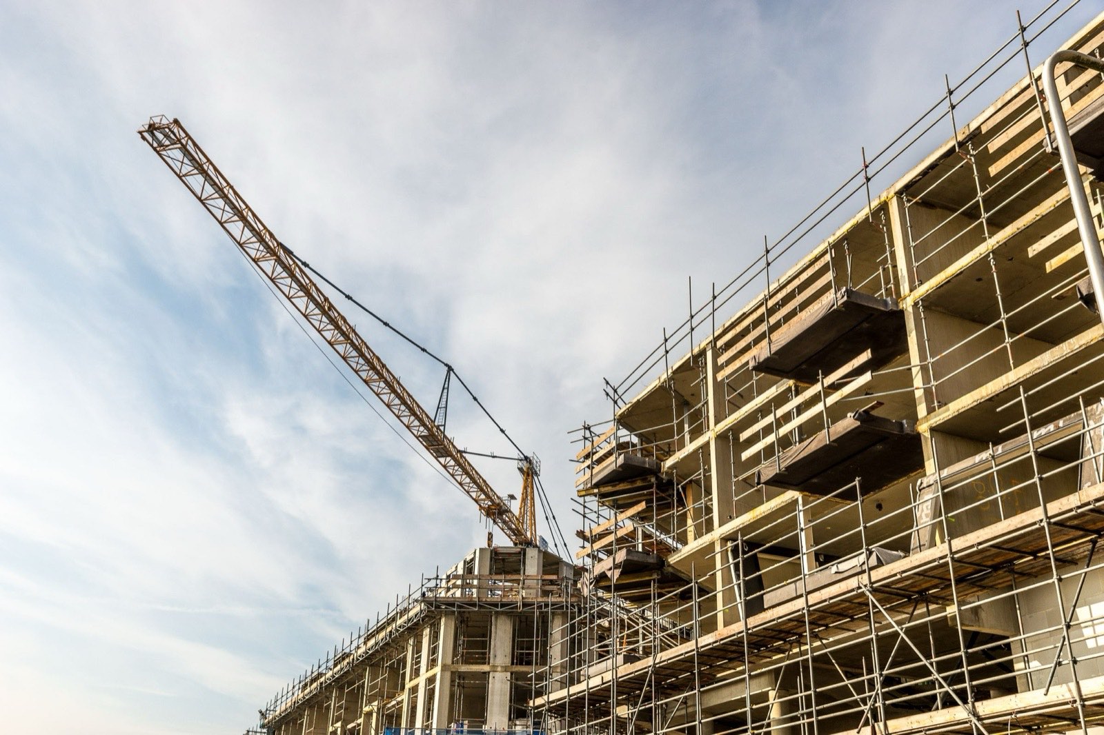Tower crane over a concrete structure in progress
