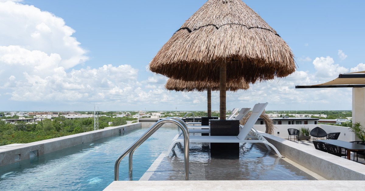 Narai's rooftop and ground-floor pools in Aldea Zamá, Tulum